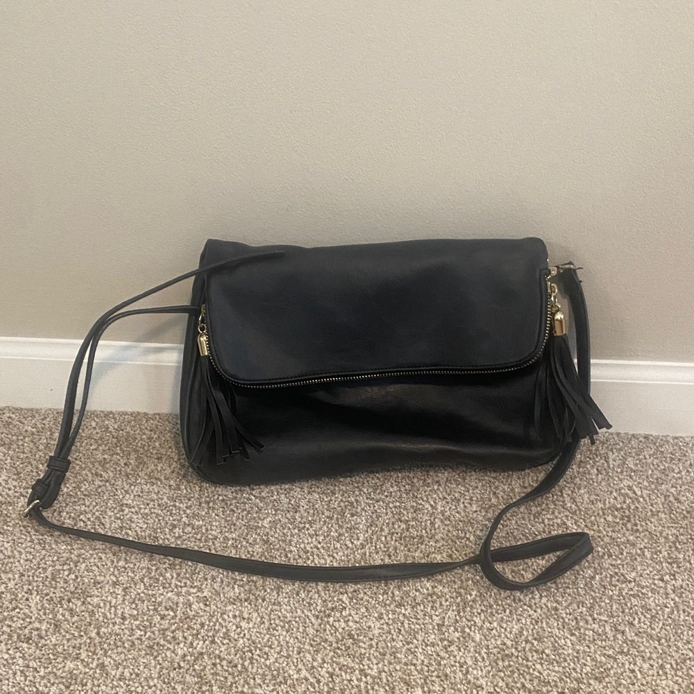 Elegant Black Crossbody Bag with Tassel Accents